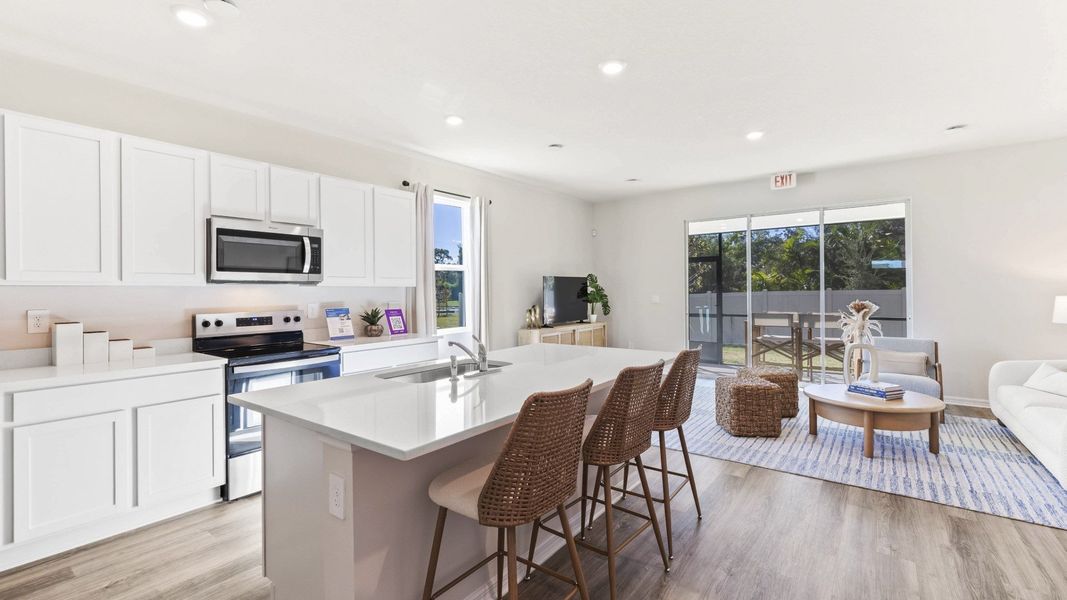 Furnished interior in a model home at The Gardens at Bay Street in Sarasota (Image 4).