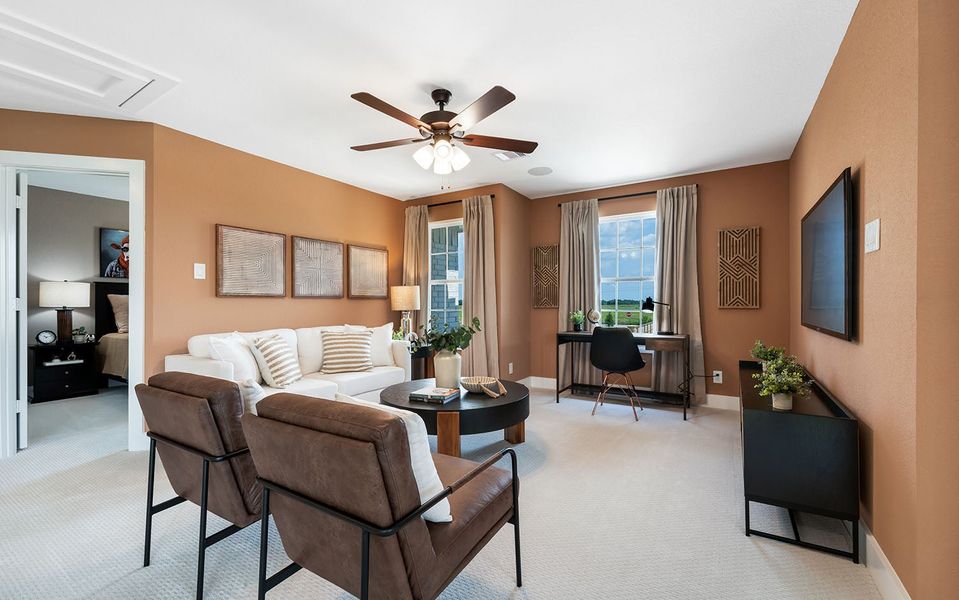 Furnished interior in a model home at Harvest Pointe in Needville (Image 21).