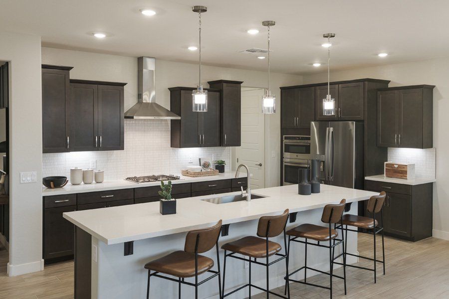 Furnished interior in a model home at Windrose V in Waddell (Image 28).