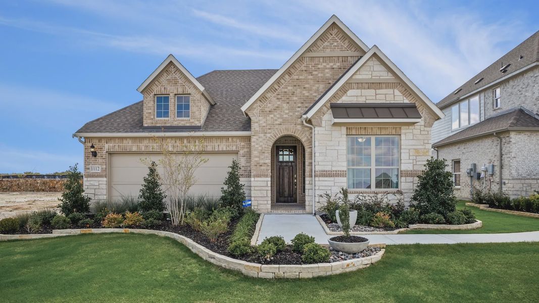 Front exterior of a home in the Anna Ranch community, located in Anna, TX (Image 2). Front exterior of a home in the Anna Ranch community, located in Anna, TX (Image 2).