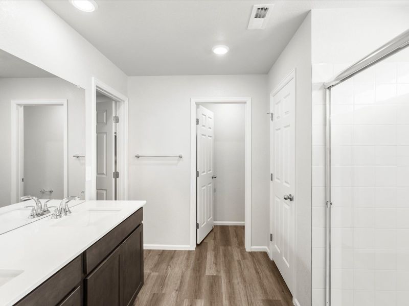 Furnished interior in a model home at Frontier Estates - The Flora Collection in Firestone (Image 17).