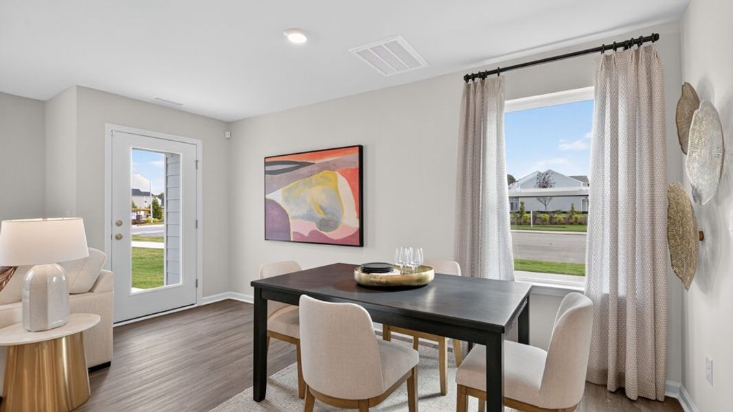 Furnished interior in a model home at The Townes at Belle Grove in Wendell (Image 26).