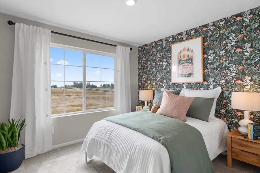 Furnished interior in a model home at The Cottages Collection at Mead Crossing in Mead (Image 10).