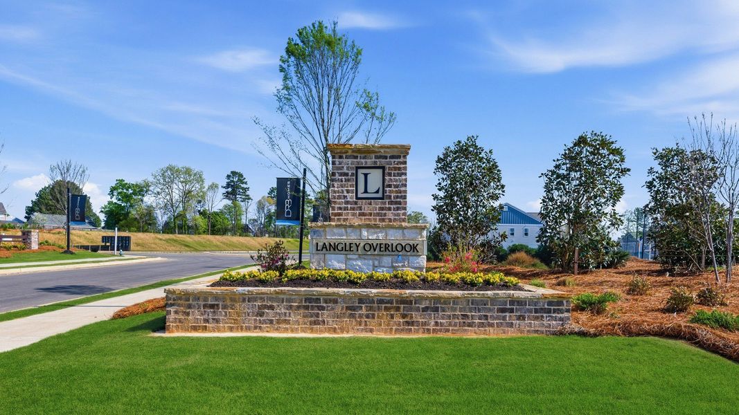 Entrance to the Langley Overlook community in Loganville, GA, featuring signage and landscaping (Image 1). Entrance to the Langley Overlook community in Loganville, GA, featuring signage and landscaping (Image 1).