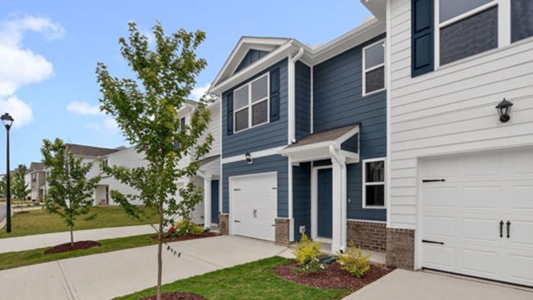 Front exterior of a home in the The Townes at Belle Grove community, located in Wendell, NC (Image 20). Front exterior of a home in the The Townes at Belle Grove community, located in Wendell, NC (Image 20).