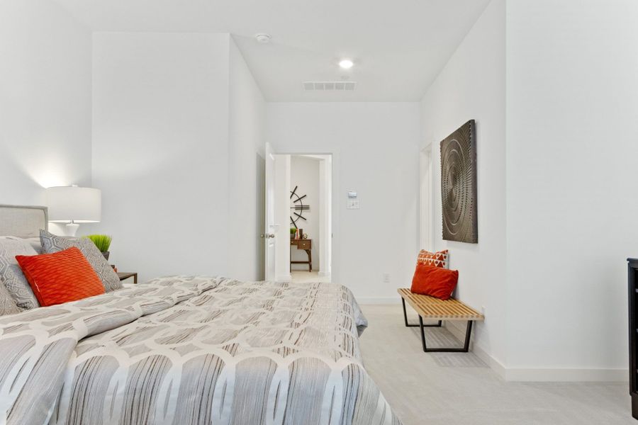 Furnished interior in a model home at Windsong Ranch Townhomes in Prosper (Image 21).