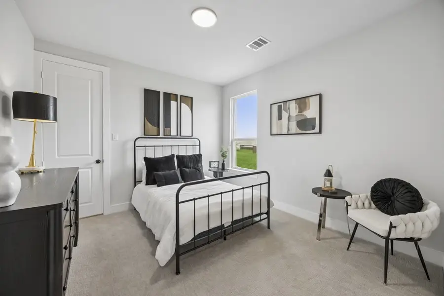 Furnished interior in a model home at Westside Preserve in Midlothian (Image 8).
