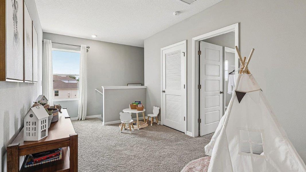 Furnished interior in a model home at Wynnstone in Davenport (Image 26).