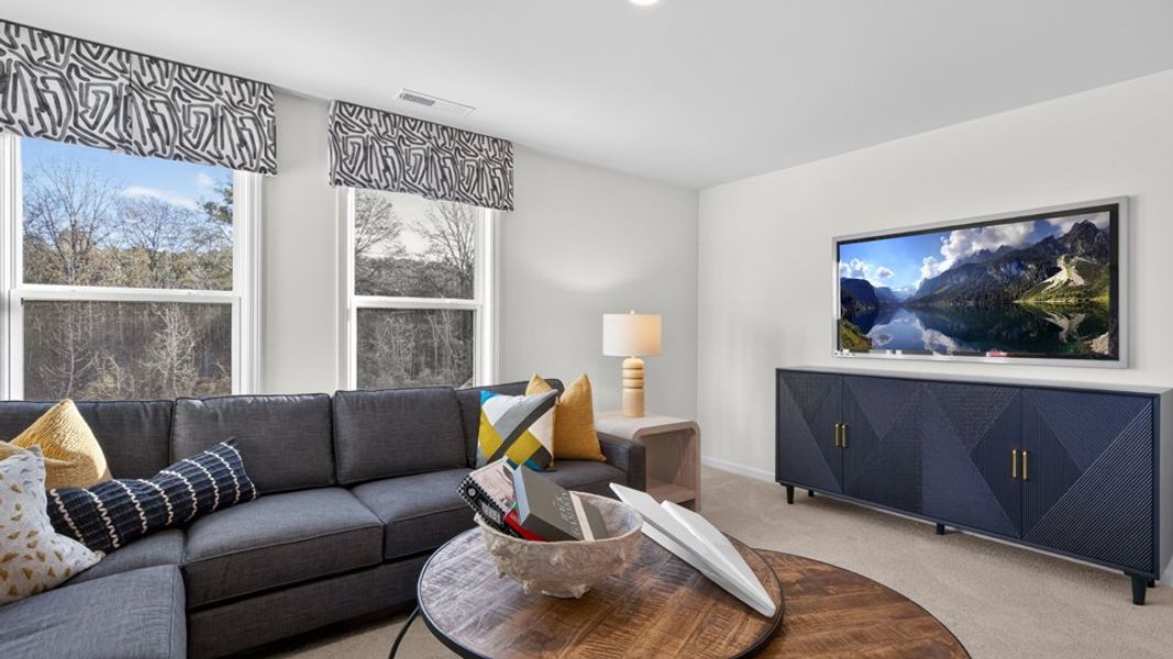 Furnished interior in a model home at The Grove at Winston Pointe in Clayton (Image 26).