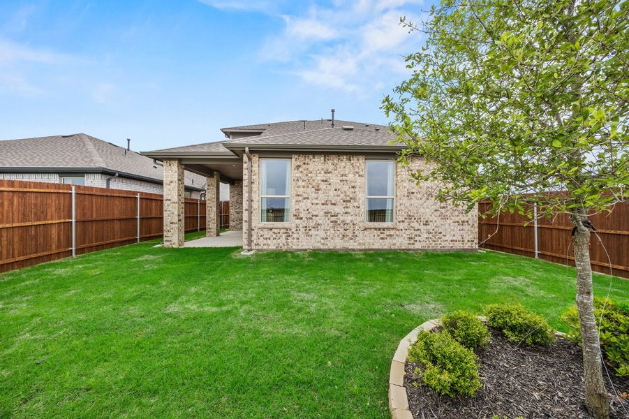 Front exterior of a home in the Northspur community, located in Terrell, TX (Image 32).