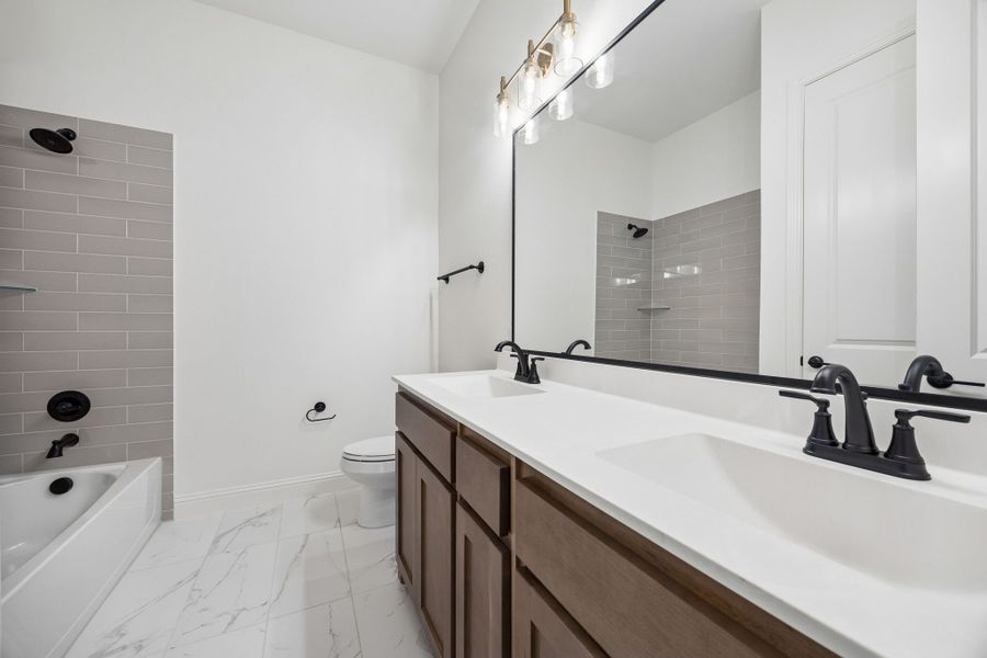 Furnished interior in a model home at Oak Creek Ranch in Midlothian (Image 19).