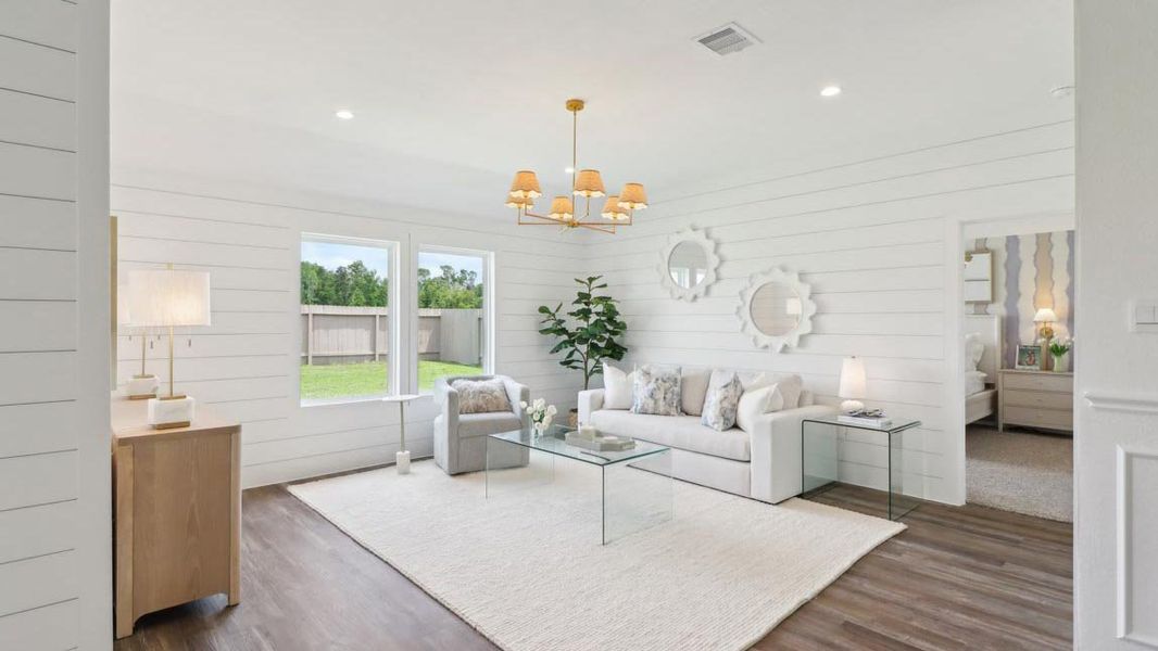 Furnished interior in a model home at Grand Pines in Magnolia (Image 5).