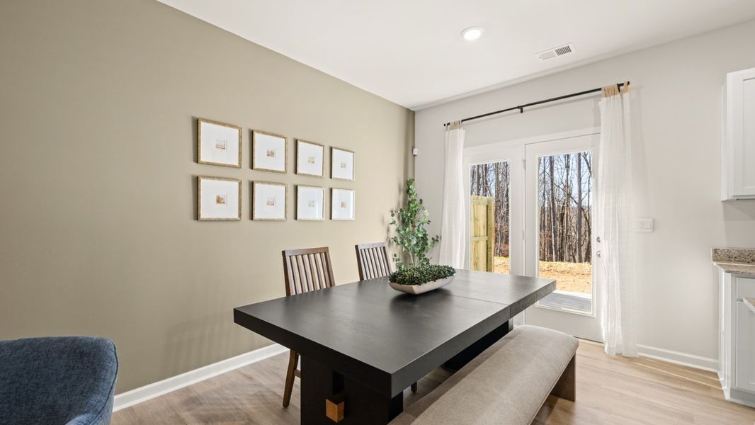 Furnished interior in a model home at Oconee Overlook Townhomes in Gainesville (Image 9).