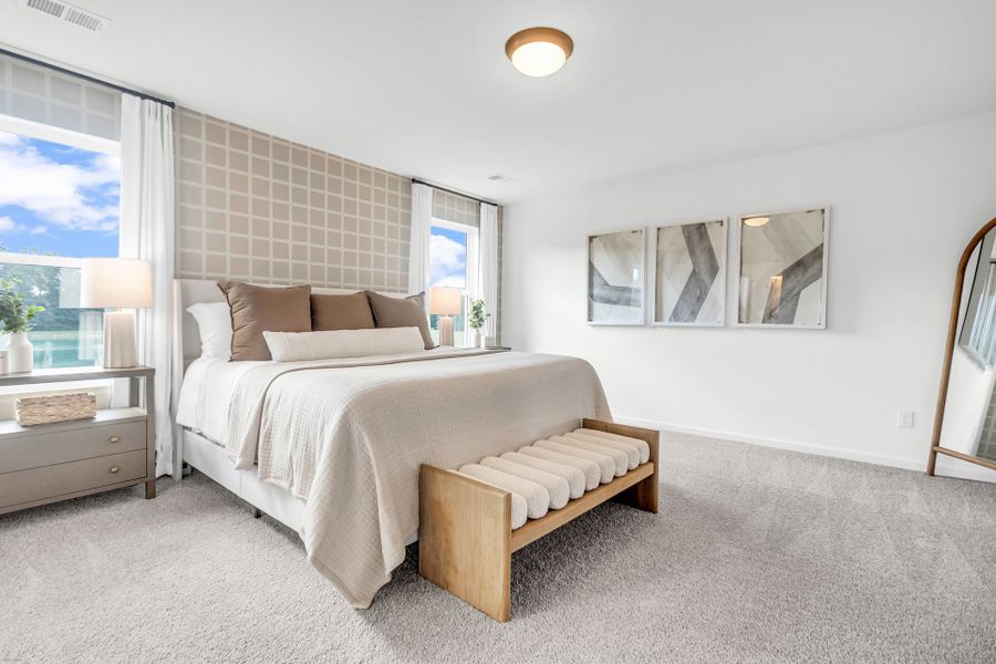 Furnished interior in a model home at Reeves Crossing in St. George (Image 13).