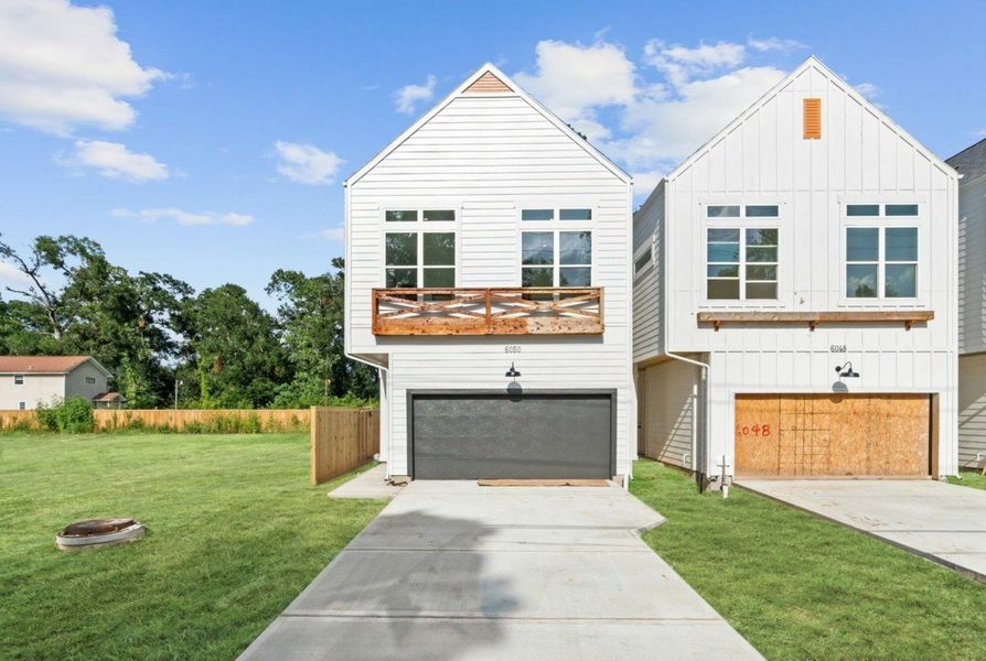 Front exterior of a home in the Cebra Court community, located in Houston, TX (Image 5).