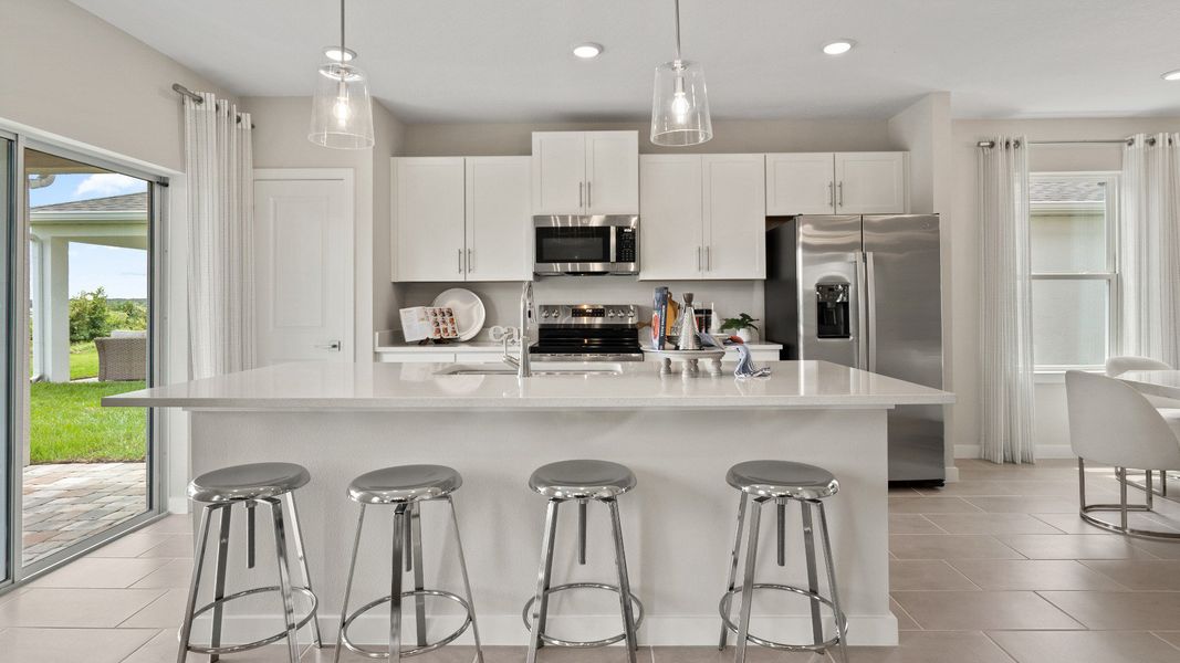 Coastal Kitchen in New Single Family Homes in New Smyrna Beach Ardisia Park DRB Homes.