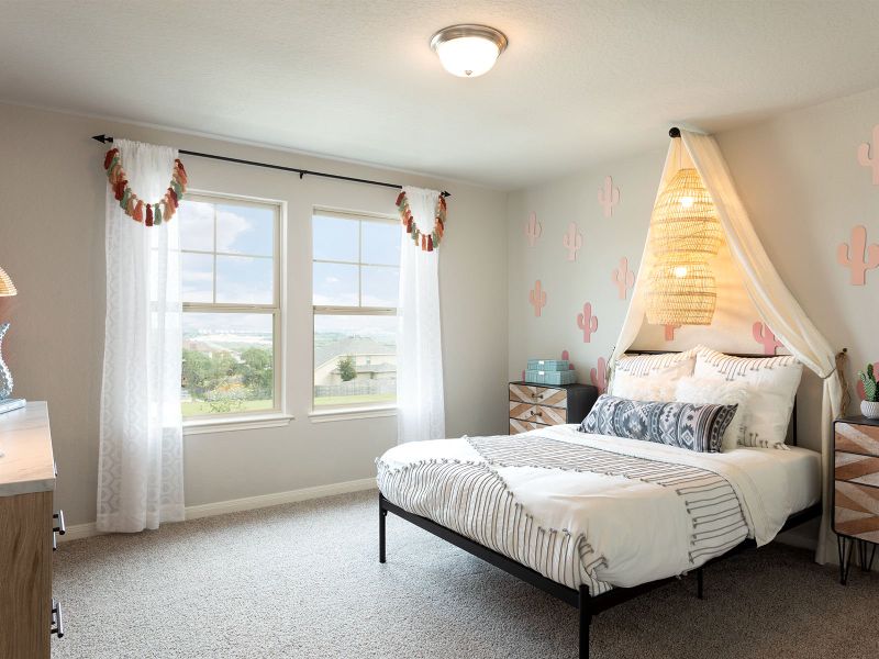 Spacious secondary bedrooms provide room for everyone.