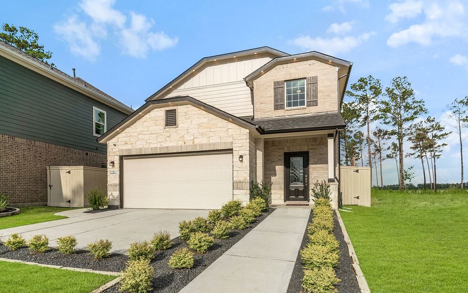 Front exterior of a home in the The Canopies community, located in Splendora, TX (Image 9). Front exterior of a home in the The Canopies community, located in Splendora, TX (Image 9).