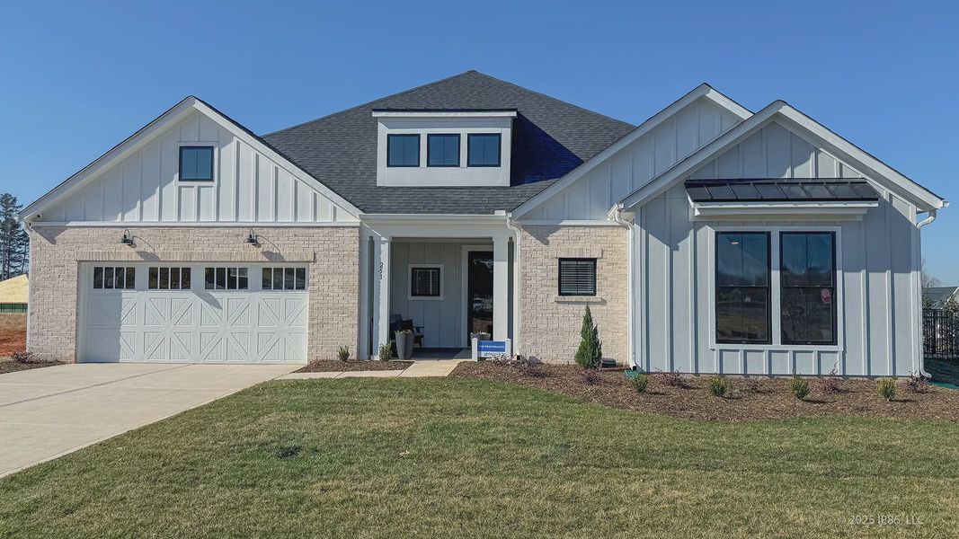 Front exterior of a home in the The Courtyards at Lake Davidson community, located in Mooresville, NC (Image 2).