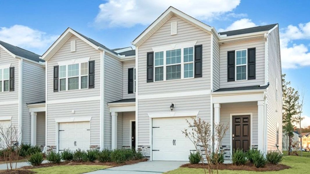 Front exterior of a home in the The Townes at Ridgewood Farms community, located in Winterville, NC (Image 15).