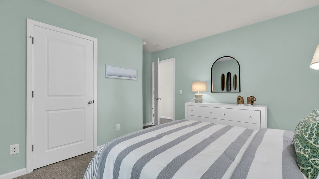 Furnished interior in a model home at The Cove at Mallard Crossing in Summerville (Image 27).