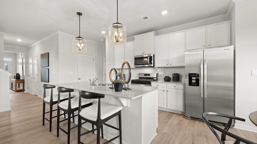 Furnished interior in a model home at Fairway 17 at Mirror Lake in Villa Rica (Image 19).