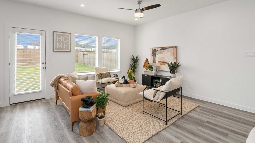 Furnished interior in a model home at Mansfield Park in Houston (Image 7).