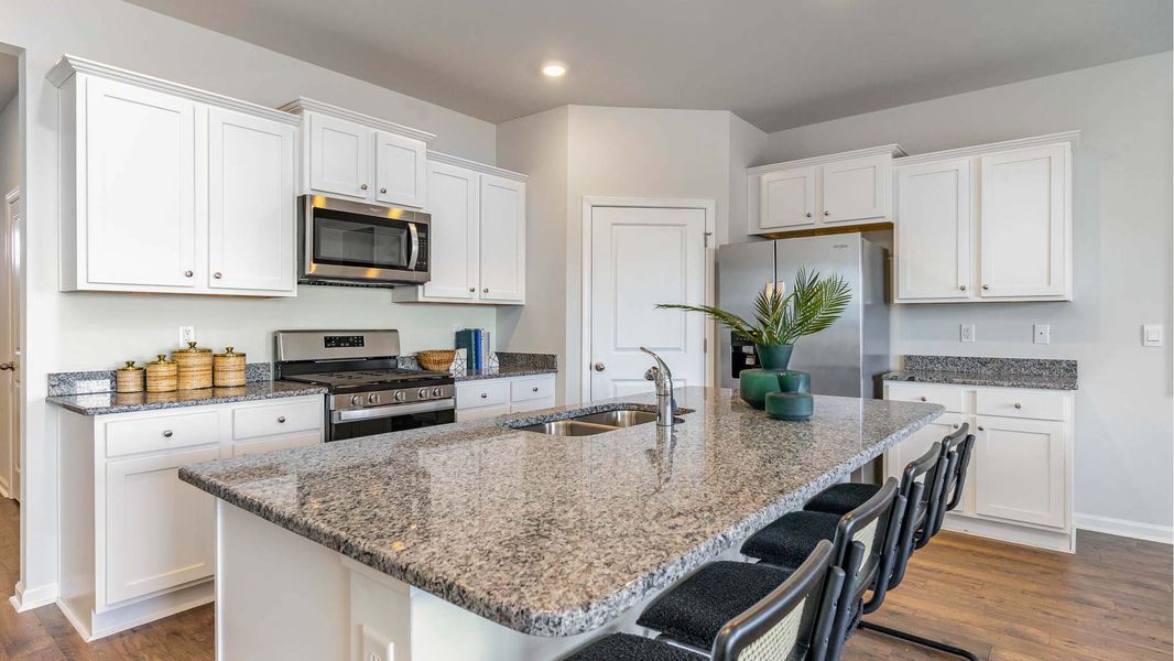 Furnished interior in a model home at The Bluffs at Mill Creek in Florence (Image 15). Furnished interior in a model home at The Bluffs at Mill Creek in Florence (Image 15).