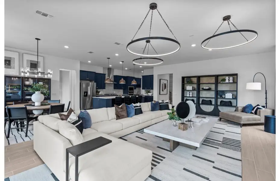 Elegant open-concept living area with natural light and seamless flow Elegant open-concept living area with natural light and seamless flow