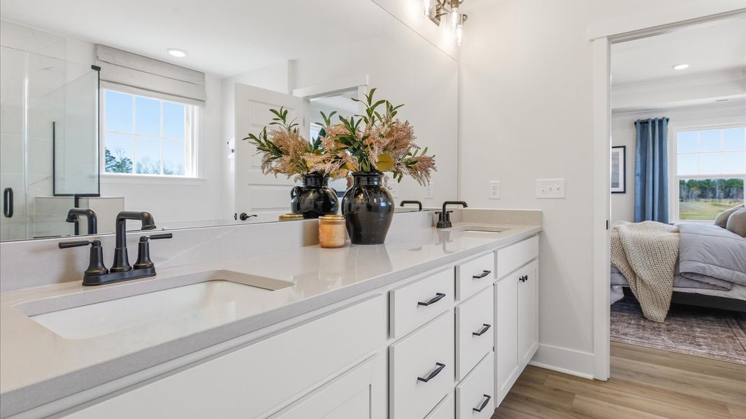 Furnished interior in a model home at Weavers Pointe in Zebulon (Image 18).