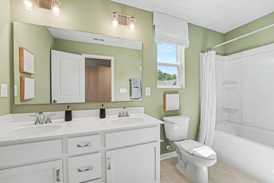 Furnished interior in a model home at White Oak Creek Crossing in Angier (Image 14). Furnished interior in a model home at White Oak Creek Crossing in Angier (Image 14).