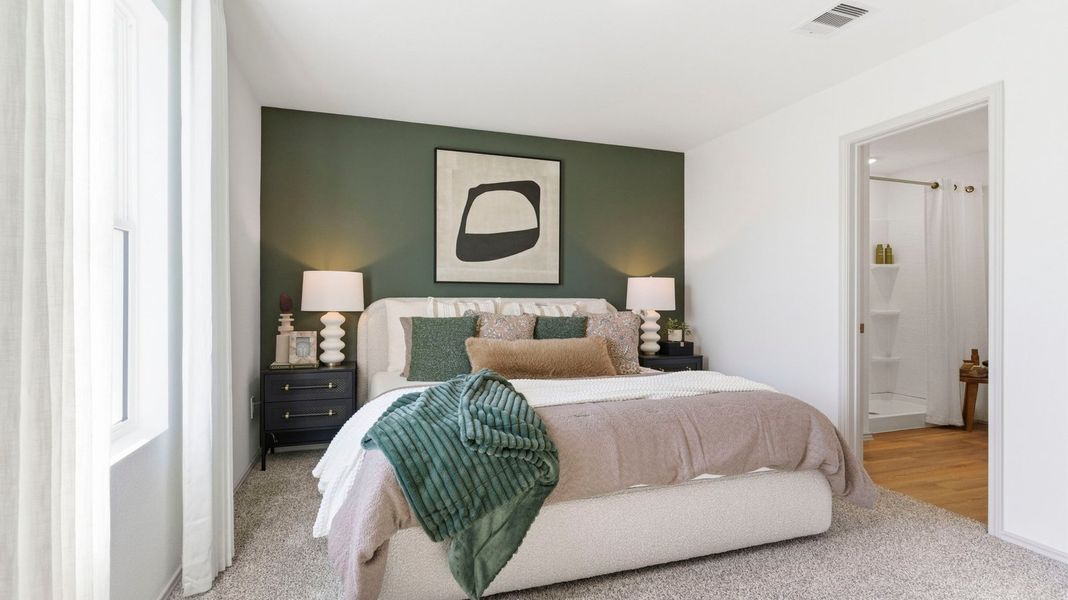 Furnished interior in a model home at Watermark in Alvin (Image 19).