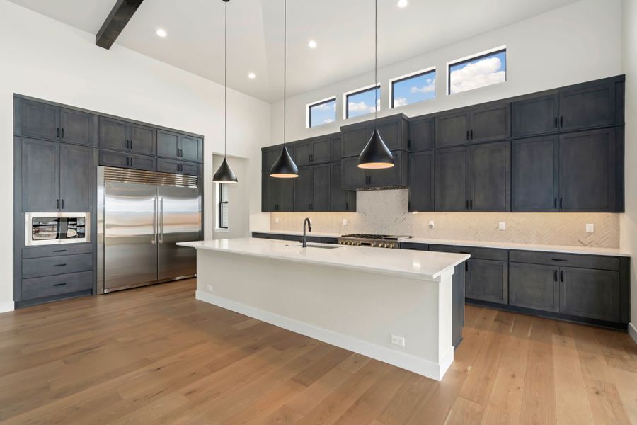 Furnished interior in a model home at Acadia at RainDance in Windsor (Image 16).