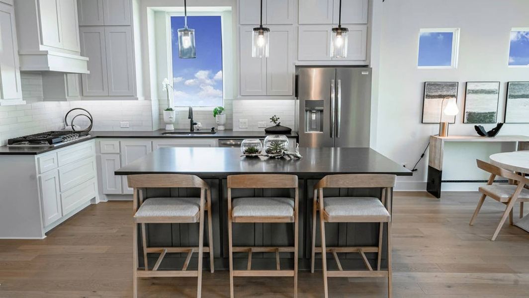 Furnished interior in a model home at Polo Ridge in Forney (Image 7).