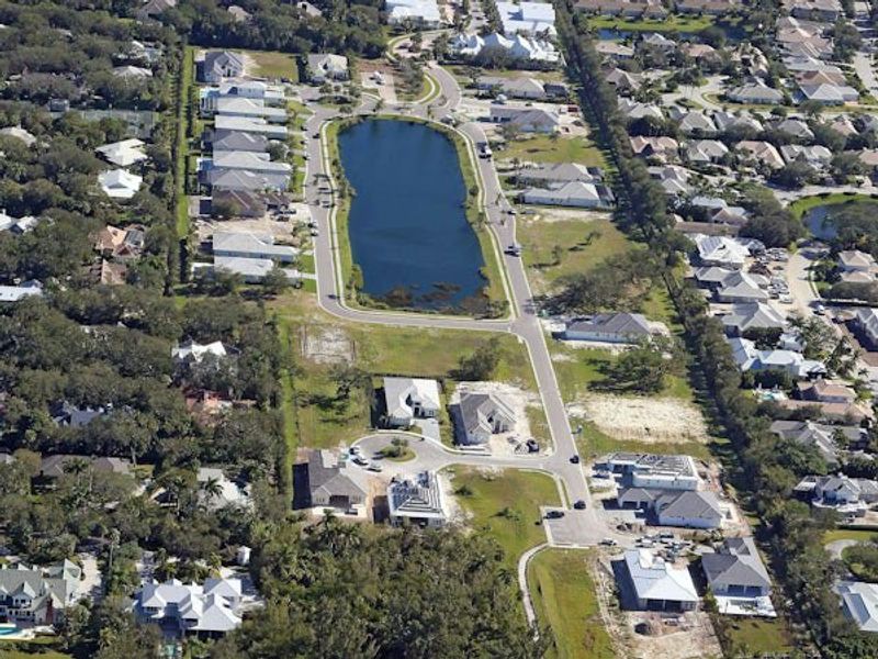 Aerial view of the The Strand community in Vero Beach, FL, showing layout and nearby surroundings (Image 24).