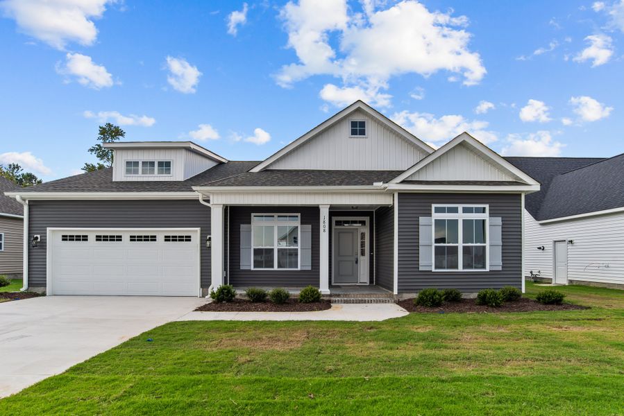 Front exterior of a home in the The Villas at Langston Farms community, located in Winterville, NC (Image 11).