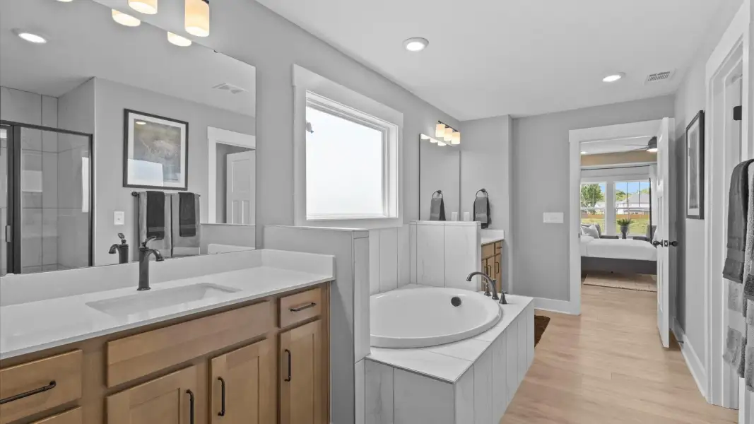 Furnished interior in a model home at Woodland Summit in Simpsonville (Image 28).