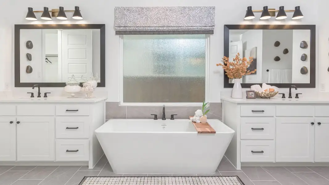 Furnished interior in a model home at Lakes Of Cane Island 60' in Katy (Image 9).