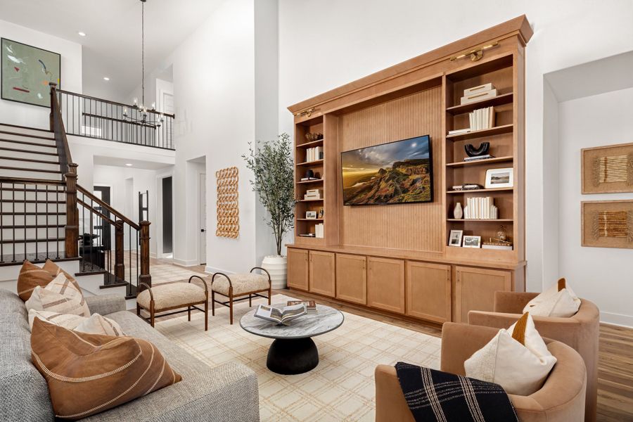 Furnished interior in a model home at Parmer Ranch in Georgetown (Image 32).