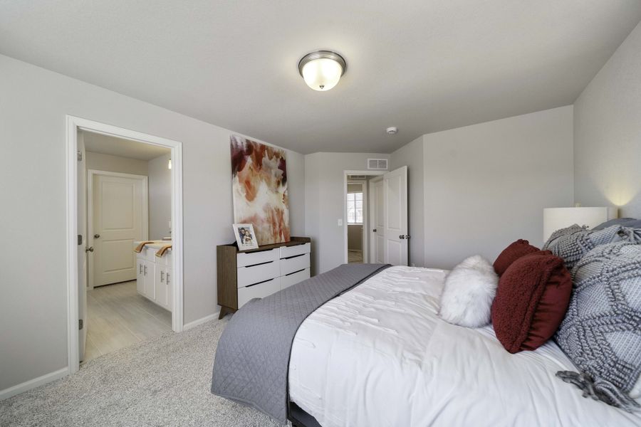 Furnished interior in a model home at Coach House at Green Valley Ranch in Aurora (Image 7).