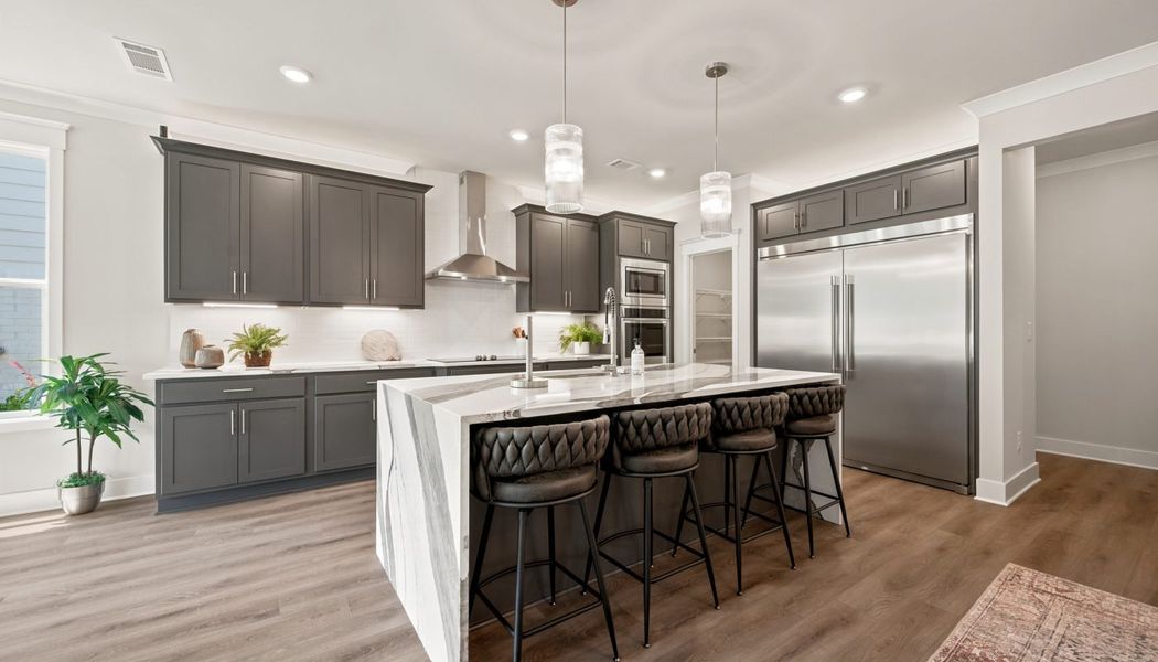 Furnished interior in a model home at Fowler Farms in Auburn (Image 119).