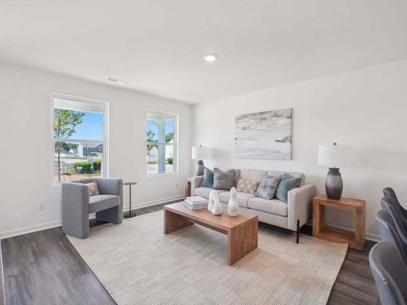 A living room with a couch and a coffee table.