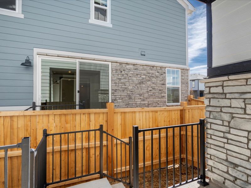 The Keystone floorplan exterior image taken at a Meritage Homes community in Aurora, CO. The Keystone floorplan exterior image taken at a Meritage Homes community in Aurora, CO.