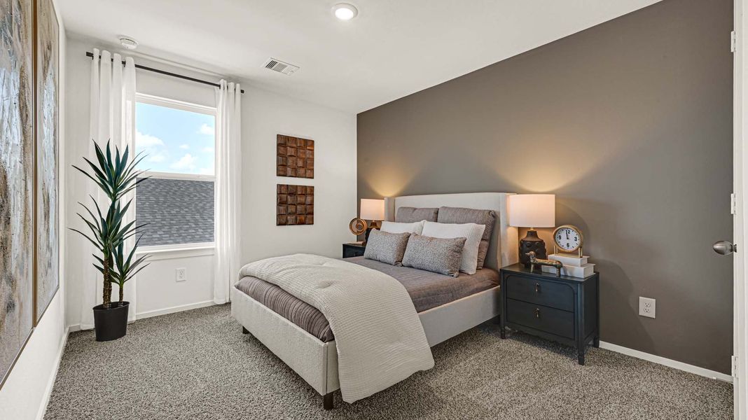 Furnished interior in a model home at August Trails in Needville (Image 21). Furnished interior in a model home at August Trails in Needville (Image 21).