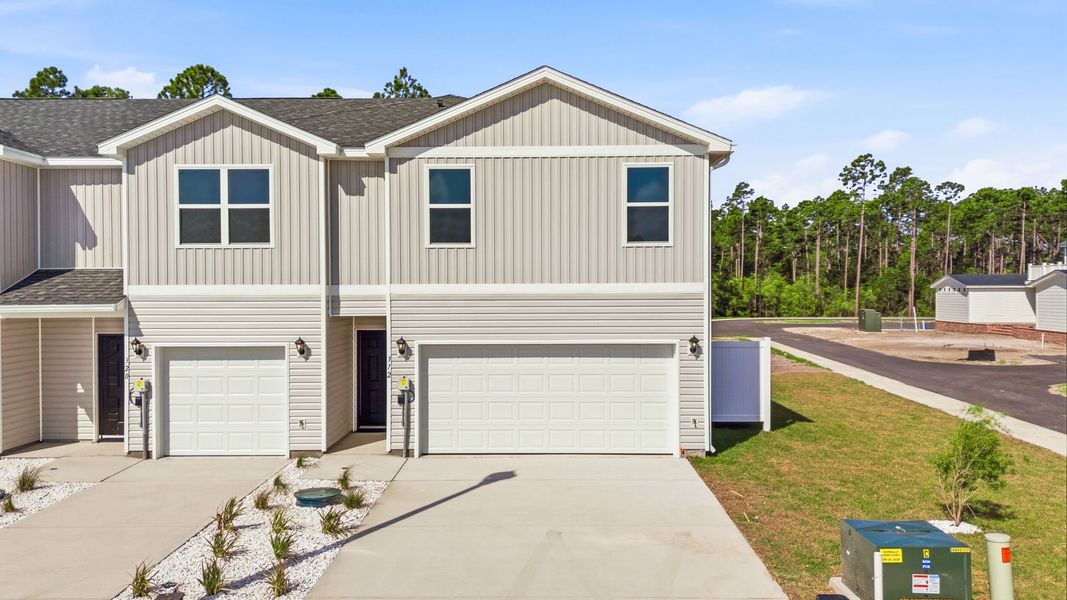 Front exterior of a home in the Chateau Nemours community, located in Port Saint Joe, FL (Image 17).