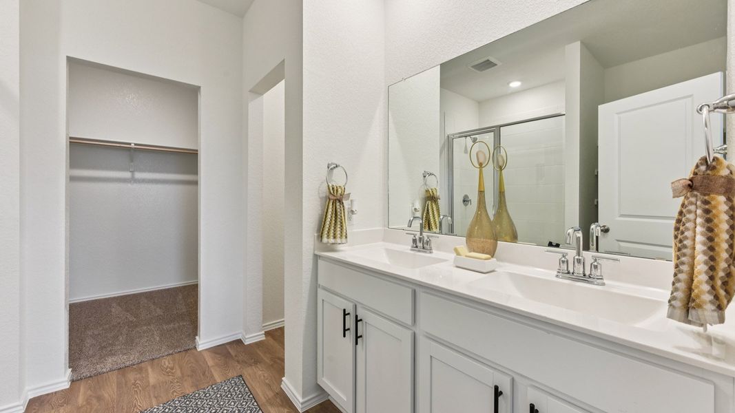 Furnished interior in a model home at Palomino in Manor (Image 31).