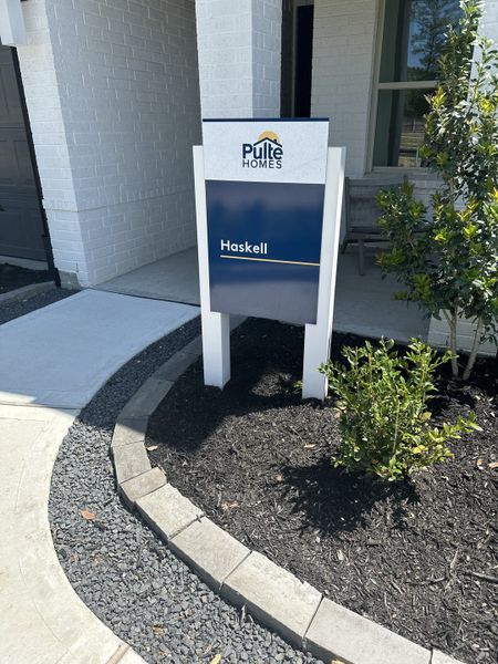 Beautiful entrance with a white brick exterior and landscaped path in Montgomery Bend by Pulte Homes (Montgomery, TX). Beautiful entrance with a white brick exterior and landscaped path in Montgomery Bend by Pulte Homes (Montgomery, TX).