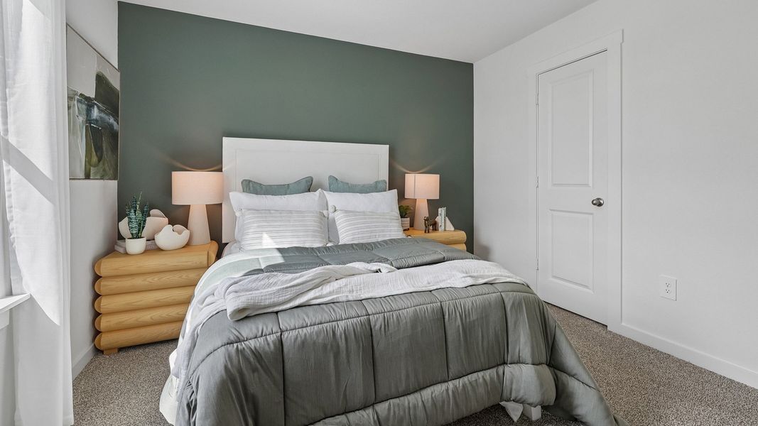 Furnished interior in a model home at Monarch Ranch in Manor (Image 35).