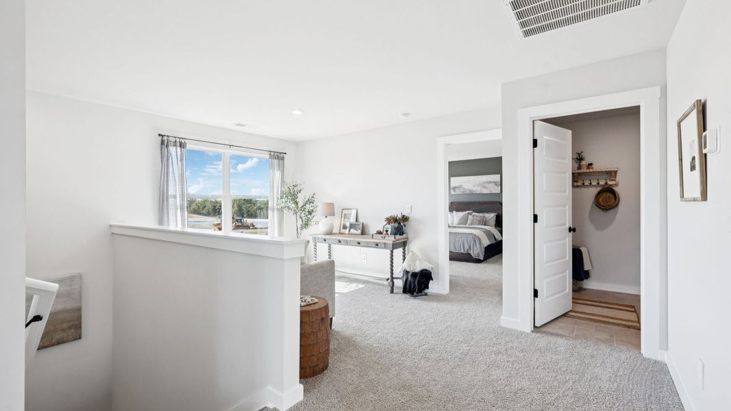 Furnished interior in a model home at Harvest Point in Spring Hill (Image 76).
