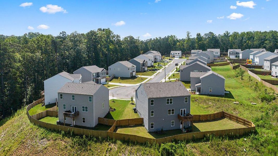 Aerial view of the Aurora Creek community in Dallas, GA, showing layout and nearby surroundings (Image 12).